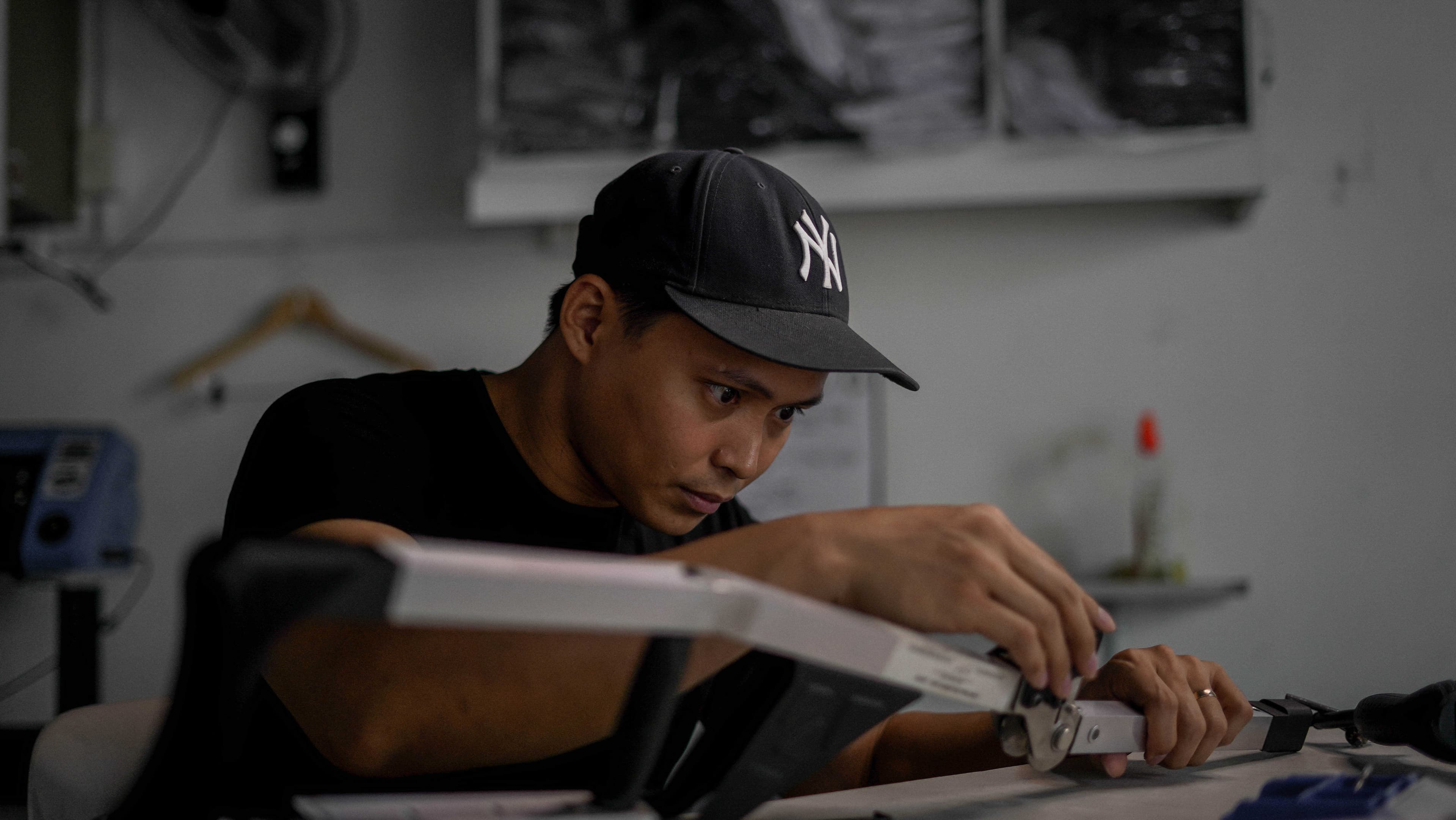 James building the NANO foldable crutch prototype by hand